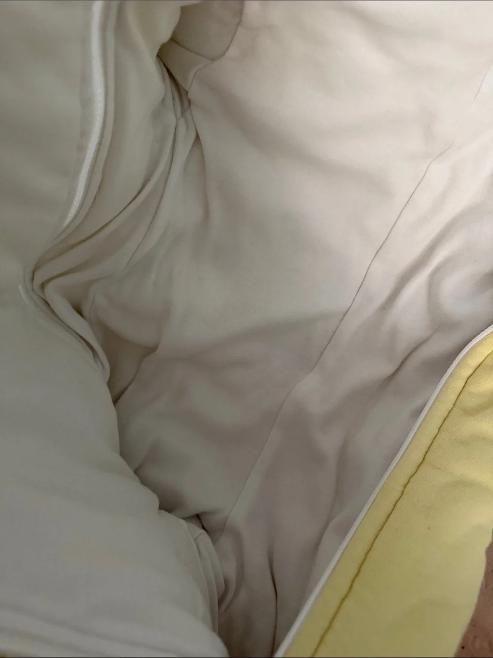 Baby Merlin’s magic sleep sack in Pale Yellow